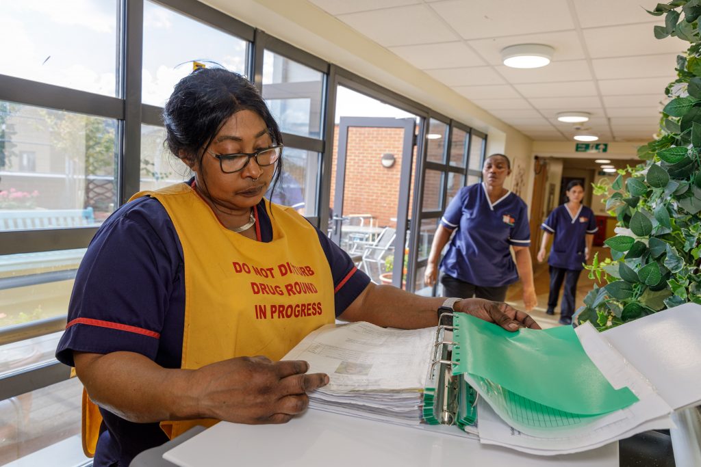 Nurse checking medicines